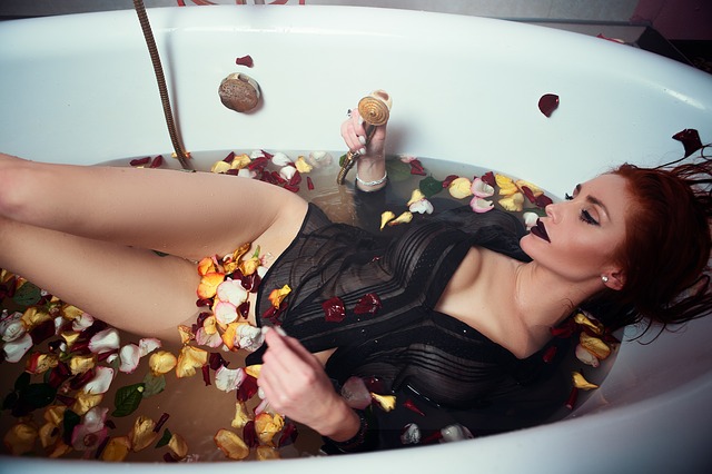 woman in bathtub as imbolc altar
